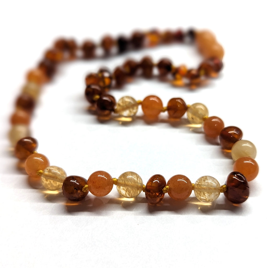 Authentic amber teething on sale necklace